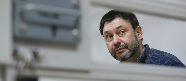 Главни уредник портала РИА Новости Украјина Кирил Вишински у суду у Херсону - Sputnik Србија