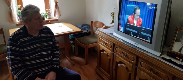 Вукослав Вучко Караџић прати изрицање пресуде Радовану Караџићу - Sputnik Србија