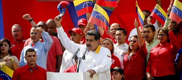 Председник Венецуеле Николас Мадуро на анти-империјалистичком маршу за мир у Каракасу Председник Венецуеле Николас Мадуро на анти-империјалистичком маршу за мир у Каракасу - Sputnik Србија