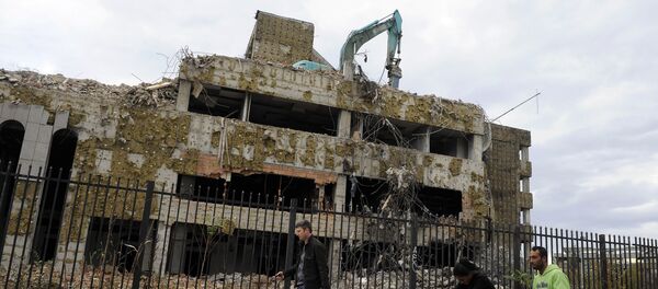 Зграда бивше амбасаде Кине у Београду која је погођена у бомбардовању НАТО-а 1999. - Sputnik Србија