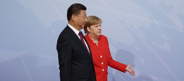 Председник Кине Си Ђинпинг и канцеларка Немачке Ангела Меркел - Sputnik Србија