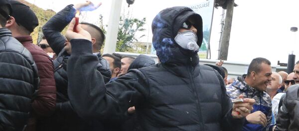 Демонстрант у Тирани Демонстрант у Тирани - Sputnik Србија