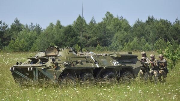 Učesnici taktičkih vojnih vežbi ukrajinskih vojnika u Lavovskoj oblasti - Sputnik Srbija