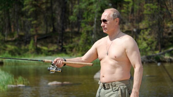 Председник Русије Владимир Путин на пецању - Sputnik Србија