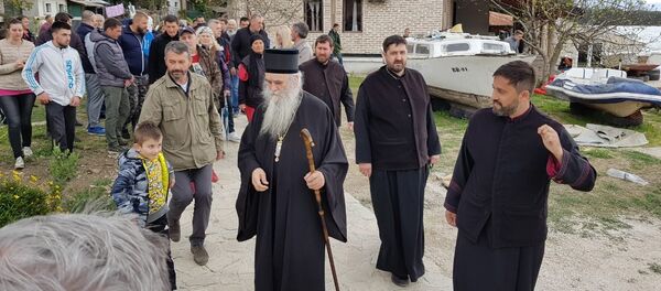 Mitropolit Amfilohije na Miholjskoj prevlaci Mitropolit Amfilohije na Miholjskoj prevlaci - Sputnik Srbija