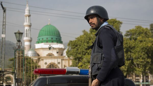 Полицајац у Пакистану - Sputnik Србија