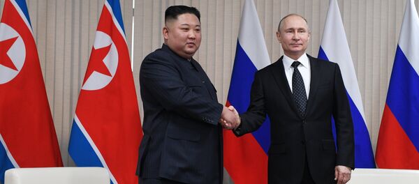 Лидери Северне Кореје и Русије Ким Џонг Ун и Владимир Путин - Sputnik Србија