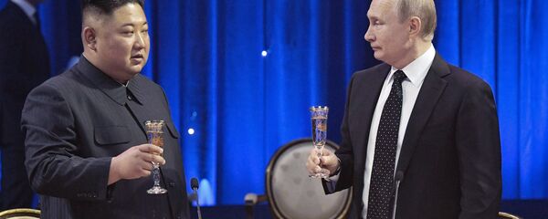 Владимир Путин и Ким Џонг Ун - Sputnik Србија