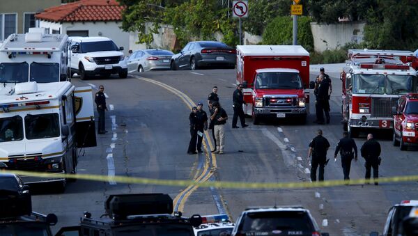 Police and fire personnel are seen at the scene of an active shooting with a suspect with a high powered rifle in the Bankers Hills section of San Diego, California, November 4, 2015. - Sputnik Србија