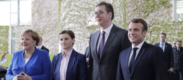 Ана Брнабић и Александар Вучић са Ангелом Меркел и Емануелом Макроном на самиту у Берлину Ана Брнабић и Александар Вучић са Ангелом Меркел и Емануелом Макроном на самиту у Берлину - Sputnik Србија