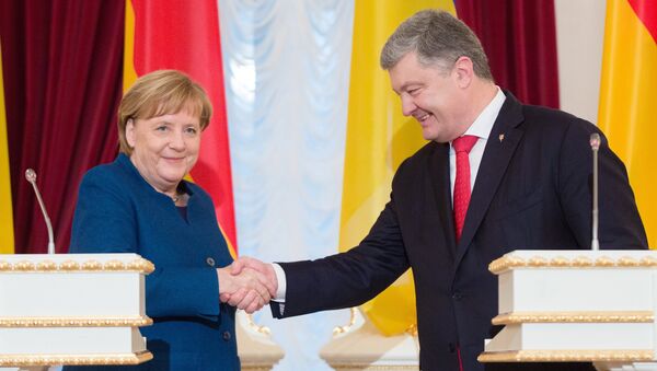 Nemačka kancelarka Angela Merkel i predsednik Ukrajine Petro Porošenko na sastanku u Kijevu - Sputnik Srbija