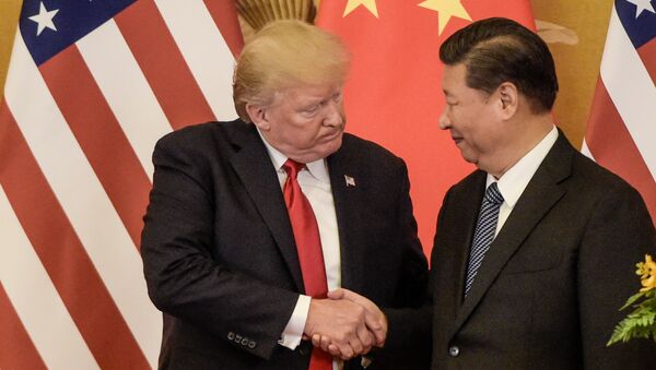 Председник САД и Кине, Доналд Трамп и Си Ђинпинг на састанку у Пекингу - Sputnik Србија