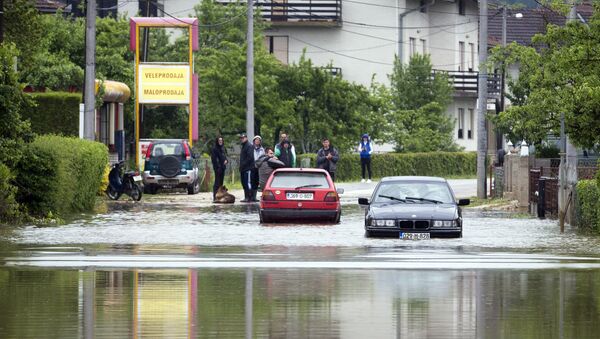 Потопљена улица у Санском Мосту - Sputnik Србија