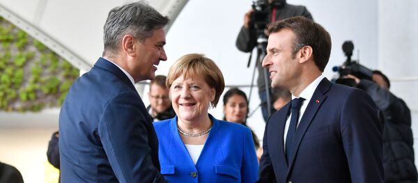 Denis Zvizdić, Angela Merkel i Emanuel Makron na balkanskom samitu u Berlinu Denis Zvizdić, Angela Merkel i Emanuel Makron na balkanskom samitu u Berlinu - Sputnik Srbija