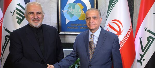 Ирански министар спољних послова Џавад Зариф са ирачким колегом Мухамедом Алхакимом Ирански министар спољних послова Џавад Зариф са ирачким колегом Мухамедом Алхакимом - Sputnik Србија