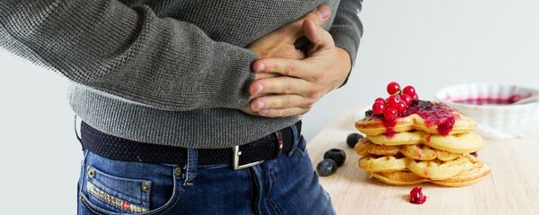 Bolovi u stomaku zbog loše hrane - Sputnik Srbija