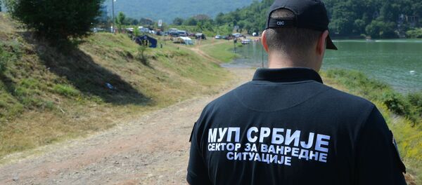 Припадник српског МУП-а за ванредне ситуације на вежбама Србија 2019 Припадник српског МУП-а за ванредне ситуације на вежбама Србија 2019 - Sputnik Србија