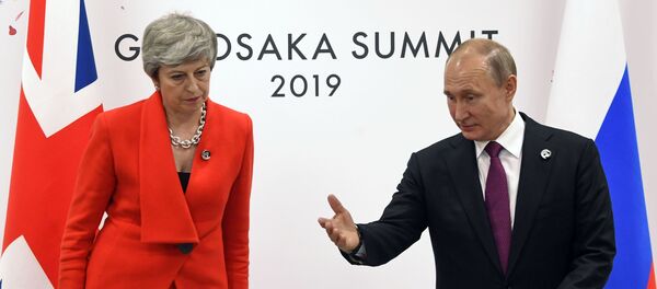 Premijerka Velike Britanije Tereza Mej i predsednik Rusije Vladimir Putin na samitu G20 u Osaki - Sputnik Srbija