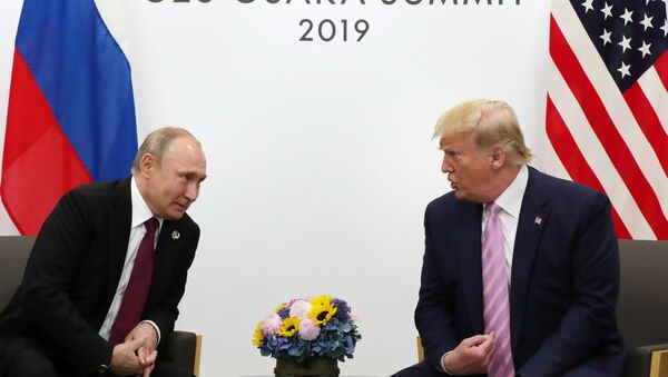 Председник Русије Владимир Путин и председник САД Доналд Трамп - Sputnik Србија