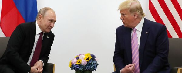 Председник Русије Владимир Путин и председник САД Доналд Трамп - Sputnik Србија