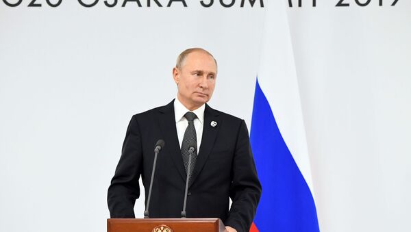 Председник Русије Владимир Путин на конференцији за новинаре по завршетку самита Г20 у Осаки - Sputnik Србија