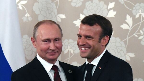 Председници Русије и Француске Владимир Путин и Емануел Макрон на састанку на маргинама самита Г20 у Осаки - Sputnik Србија