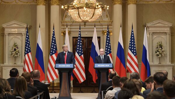 Председници САД и Русије Доналд Трамп и Владимир Путин на заједничкој конференцији за медије након састанка у Хелсинкију - Sputnik Србија