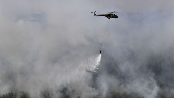 Gašenje požara u Krasnojarskom kraju - Sputnik Srbija