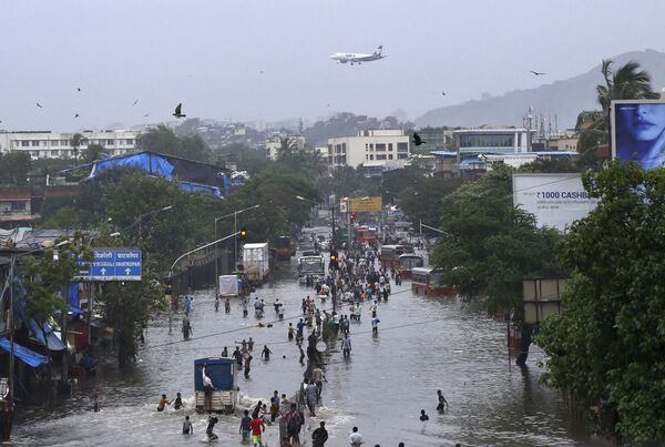 Поплаве у Индији однеле 147 живота (фото) Поплаве у Индији однеле 147 живота (фото) - Sputnik Србија