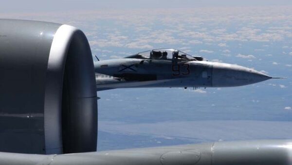Približavanje Su-27 američkom izviđačkom avionu RC-135U - Sputnik Srbija