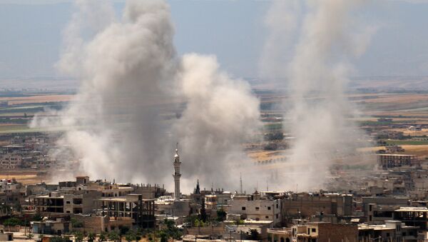 Сиријски град Хан Шејхун током борби сиријских владиних снага и терориста - Sputnik Србија