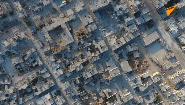Поглед из ваздуха на сиријски Хан Шејхун - Sputnik Србија