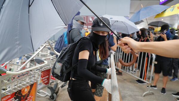 Демонстранткиња у Конгконгу - Sputnik Србија