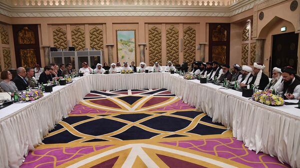 Америчка и талибанска делегација током преговора у Катару. - Sputnik Србија