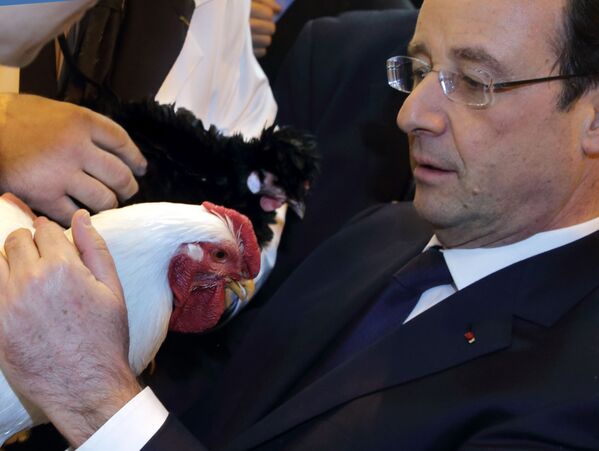 Бивши председник Француске Франсоа Оланд у посети сајму пољопривреде у Паризу. - Sputnik Србија