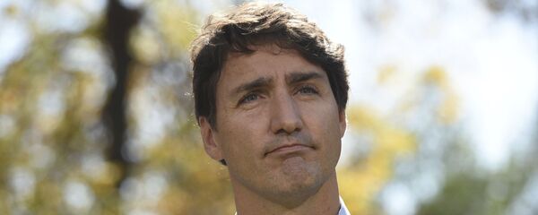 Џастин Трудо у центру скандала у Канади - Sputnik Србија