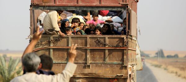 Kurdski civili u Siriji napuštaju domove ispred turske vojske - Sputnik Srbija