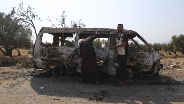 Уништено возило након напада на село у сиријској провинцији Идлиб где се наводно скривао лидер ДАЕШ-а Абу Бакр ел Багдади - Sputnik Србија