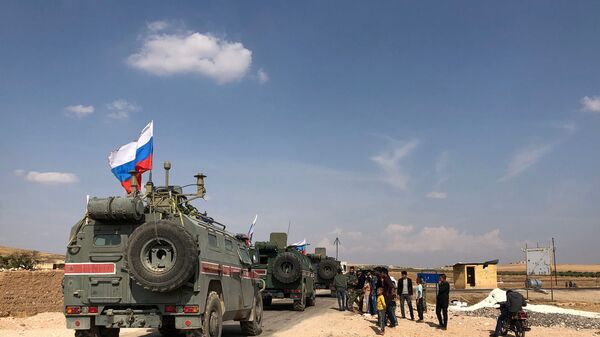 Oklopna vozila ruske vojne policije u Kobaniju na sirijsko-turskoj granici - Sputnik Srbija
