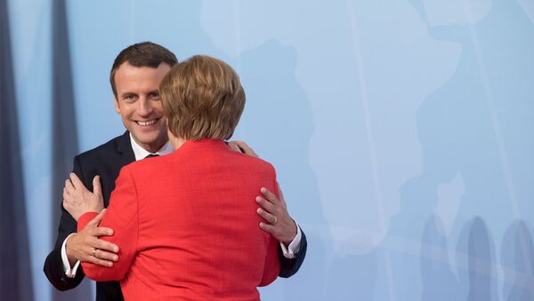Emanuel Makron i Angela Merkel - Sputnik Srbija