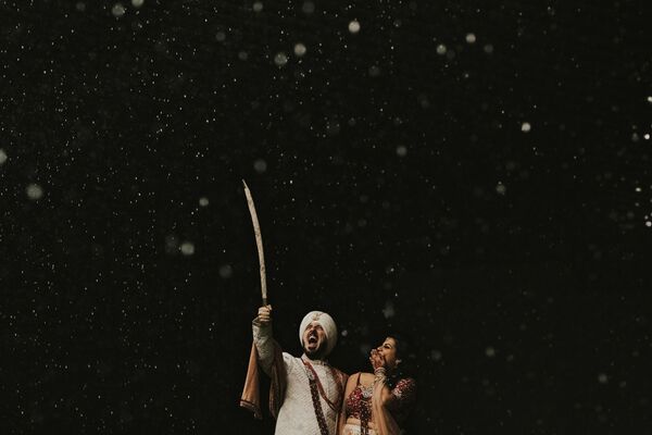 Фотографија канадских фотографа Кета и Џефа, који су победили на Међународном такмичењу „Фотограф године са венчања“. - Sputnik Србија