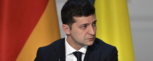 Председник Украјине Владимир Зеленски на заједничкој конференцији за медије након самита нормандијске четворке у Паризу Председник Украјине Владимир Зеленски на заједничкој конференцији за медије након самита нормандијске четворке у Паризу - Sputnik Србија