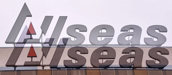 Лого швајцарске компаније „Олсиз“ - Sputnik Србија