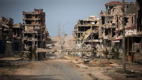 Oštećene zgrade u libijskom gradu Sirtu - Sputnik Srbija