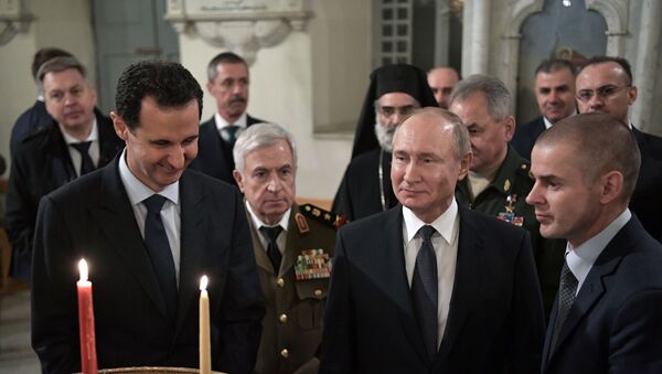 Predsednici Sirije i Rusije, Bašar Asad i Vladimir Putin, tokom posete pravoslavnoj crkvi Presvete Bogorodice u Damasku - Sputnik Srbija