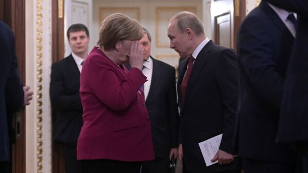 Руски председник Владимир Путин и немачка канцеларка Ангела Меркел - Sputnik Србија