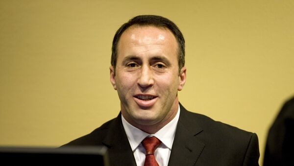 Ramuš Haradinaj, snimljen 3. aprila 2008, dok se osmehuje očekujući oslobađajuću presudu u sudnici Haškog tribunala. - Sputnik Srbija