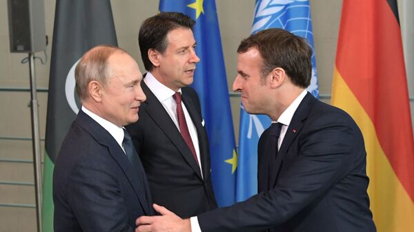 Председник Русије Владимир Путин и председник Француске Емануел Макрон - Sputnik Србија