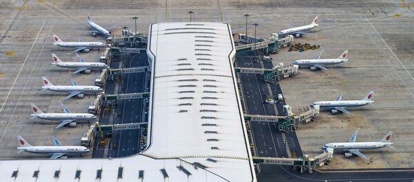 Avioni na aerodromu u kineskom Vuhanu - Sputnik Srbija