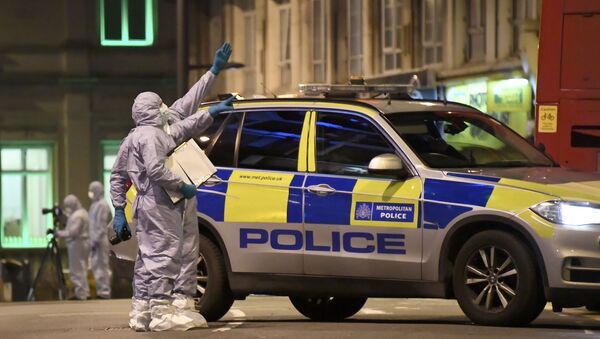 Forenzičari rade na mestu napada nožem u Londonu - Sputnik Srbija